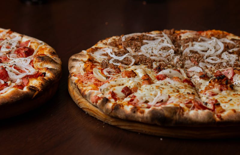 Gourmet pizza topped with fresh vegetables and premium ingredients