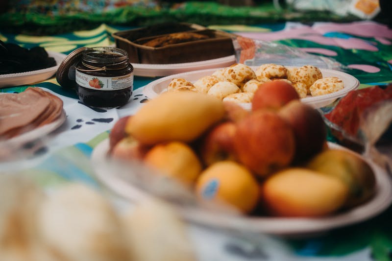 Colourful morning brunch spread with pastries and fresh produce